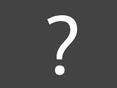 Ein Fragezeichen auf grauem Grund